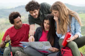 Group Of People Looking at Map