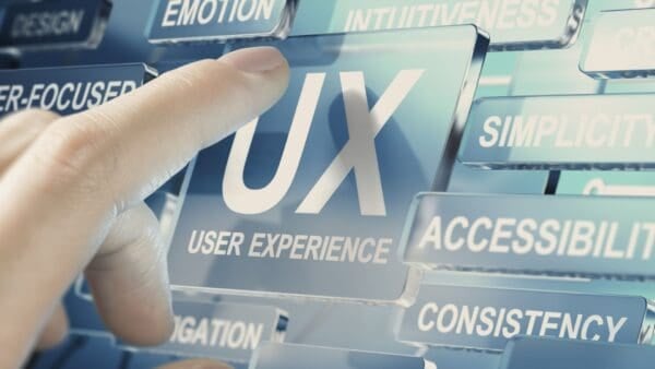 finger pointing at a UX button